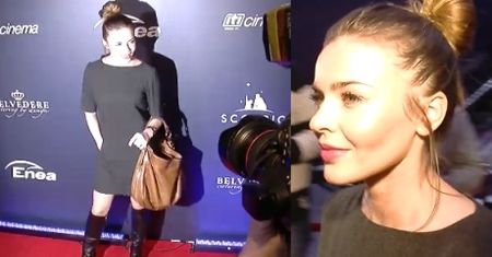 Herbuś pozuje na premierze
