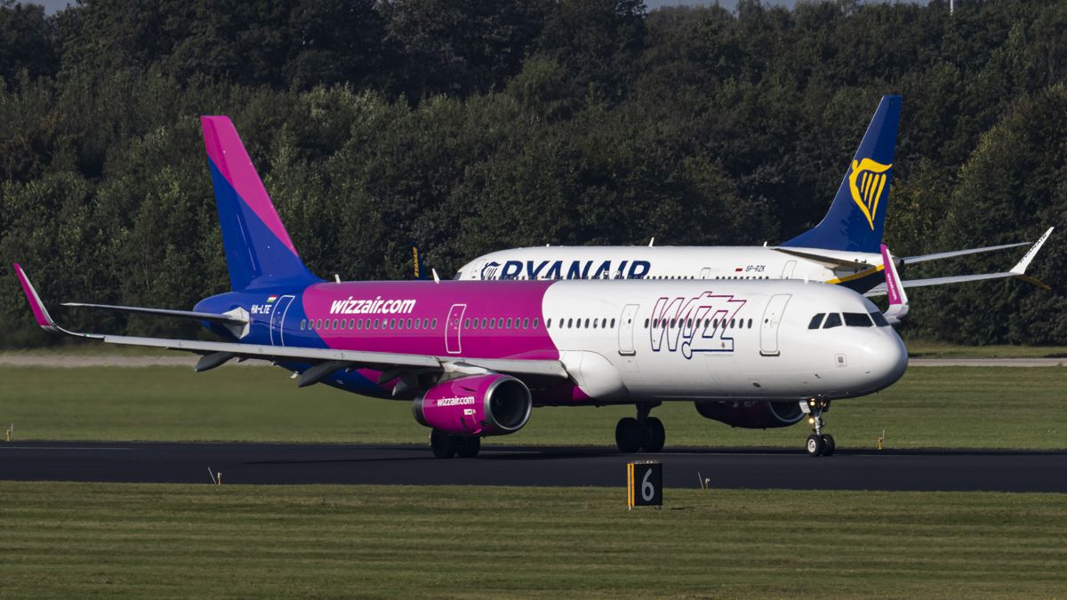 The departing Wizz Air Airbus A321 aircraft as seen taxiing, take off, roation and flying phase from Eindhoven Airport EIN. The A321-200 passenger airplane of the ultra low cost airline Wizz Air has the registration HA-LTE and is powered by 2x IAE jet engines with an all economy seat configuration. The passenger plane is taking off for a flight to Belgrade BEG in Serbia as W64072. WizzAir is a Hungarian budget low cost airline carrier with head office in Budapest, Hungary. A Boeing 737 MAX 8 of Ryanair is visible in the background, one of the main competitors in the low cost market. Eindhoven, the Netherlands on September 2023 (Photo by Nicolas Economou/NurPhoto via Getty Images)