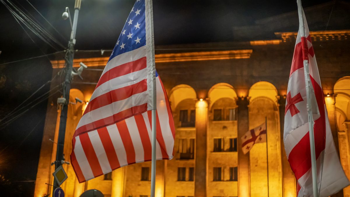 Georgian and American flags against the background of the Parliament in Tbilisi at night during a rally close up
Georgian and American flags against the background of the Parliament in Tbilisi at night during a rally close up
Yaraslau Mikheyeu
