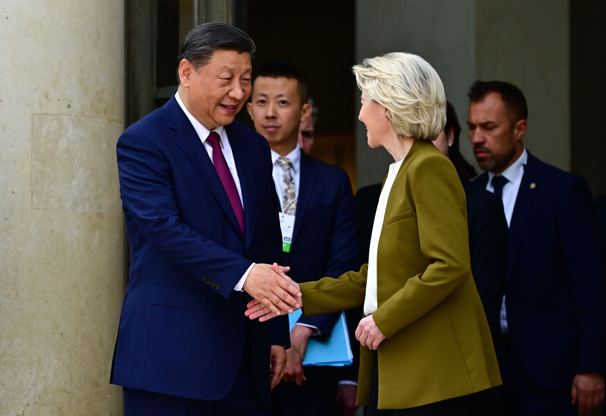 PARIS, FRANCE - MAY 6: European Commission President Ursula von der Leyen shakes hands with with Chinese President, Xi Jinping after holding a trilateral meeting including French President Emmanuel Macron as part of the Chinese president's two-day state visit at Elysee Palace on May 6 2024 in Paris, France. Chinese President Xi Jinping is attending a bilateral meeting with Macron, followed by participation in a China-France economic forum and a State Dinner. After his visit to Paris, President Xi will stop in Serbia and Hungary. (Photo by Christian Liewig - Corbis/Corbis via Getty Images)