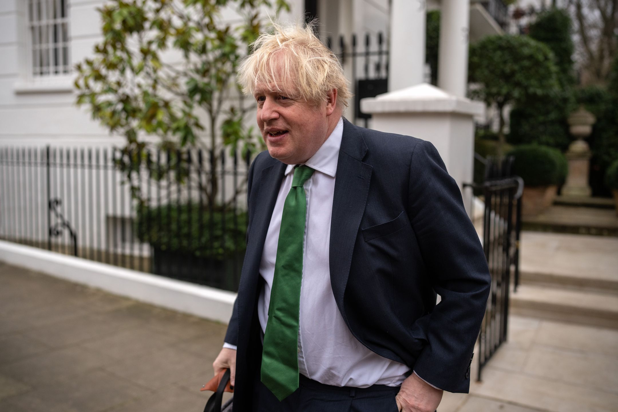 LONDON, ENGLAND - FEBRUARY 20: Former British Prime Minister Boris Johnson leaves his home on February 20, 2023 in London, England. According to reports, Johnson is against Prime Minister Rishi Sunak's plans to overhaul Northern Ireland's post-Brexit arrangements. (Photo by Carl Court/Getty Images)