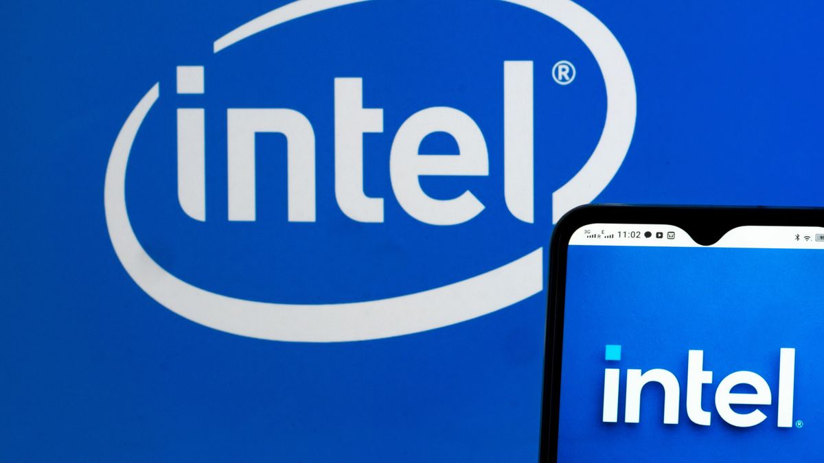 UKRAINE - 2021/05/20: In this photo illustration Intel Corporation logo seen displayed on a smartphone and in the background. (Photo Illustration by Igor Golovniov/SOPA Images/LightRocket via Getty Images)