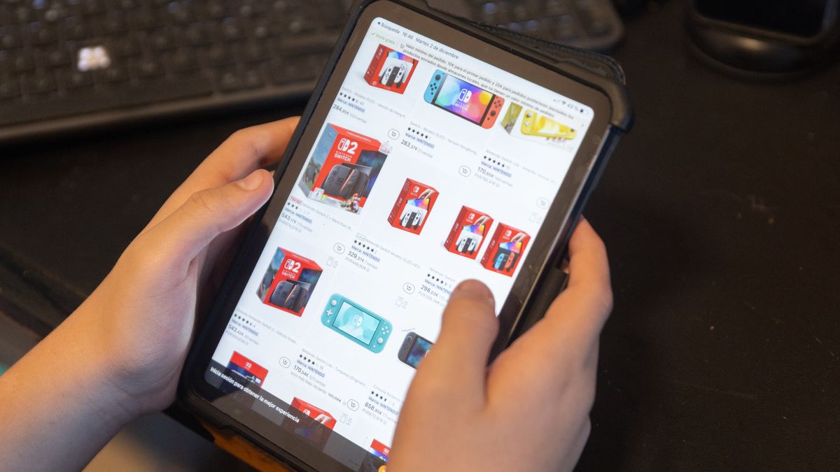 MADRID, SPAIN - DECEMBER 02: A person searches on Aliexpress on December 2, 2025, in Madrid, Spain. From 2026, the exemption from tariffs for orders of less than 150 euros from China will be eliminated, making purchases on platforms such as Shein, Temu and AliExpress more expensive. This measure seeks to curb unfair competition from the massive entry of cheap Chinese products into Europe. (Photo By Eduardo Parra/Europa Press via Getty Images)