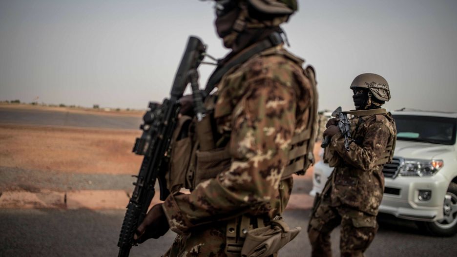 Temporary(FILES) In this file photo taken on July 03, 2019 Members of FAMA (Mali Armed Forces) special forces stand ready on the tarmac of the Sevare Airport, ahead of the visit of the Malian Prime Mister Boubou Cisse. - Gunfire broke out at a key army base near Mali's capital Bamako on August 18, 2020, officials and witnesses said, triggering fears of a mutiny in the crisis-stricken Sahel state.   Details of the events were sketchy, but the sources said the soldiers fired their guns into the air at a base in Kati, a town some 15 kilometres (nine miles) from Bamako. (Photo by Marco LONGARI / AFP)MARCO LONGARI