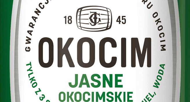 Piwo Okocim z jednolitą szatą graficzną podkreślającą jego tradycję