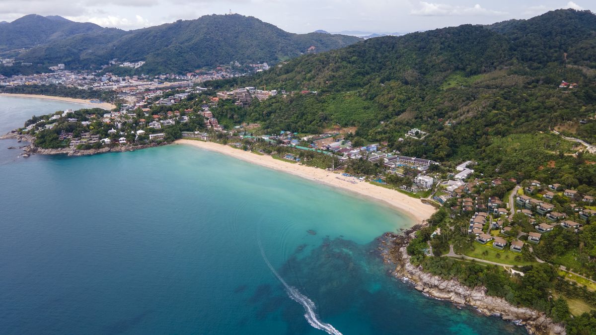 In an aerial view, Kata Noi beach stretches out along the
KARON, PHUKET, THAILAND - 2023/10/21: (EDITORS NOTE: Image taken with a drone.) In an aerial view, Kata Noi beach stretches out along the Phuket coastline in Phuket. Thailand's tourism numbers are on track in 2023 to government projections of 28 million, but still short of the 40 million pre-pandemic levels of 2019. (Photo by Stephen J. Boitano/LightRocket via Getty Images)
Stephen J. Boitano
phuket, aerial, bay, boats, coast, high angle