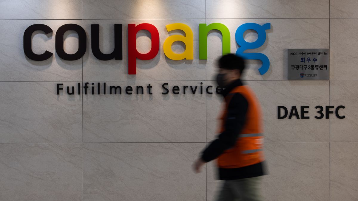 A Coupang Inc. logo at the company's fulfillment center in Daegu, South Korea, on Monday, Feb. 6, 2023. Coupang, the South Korean e-commerce pioneer, has invested about $260 million in the 12-story fulfillment operation in Daegu. Photographer: SeongJoon Cho/Bloomberg via Getty Images