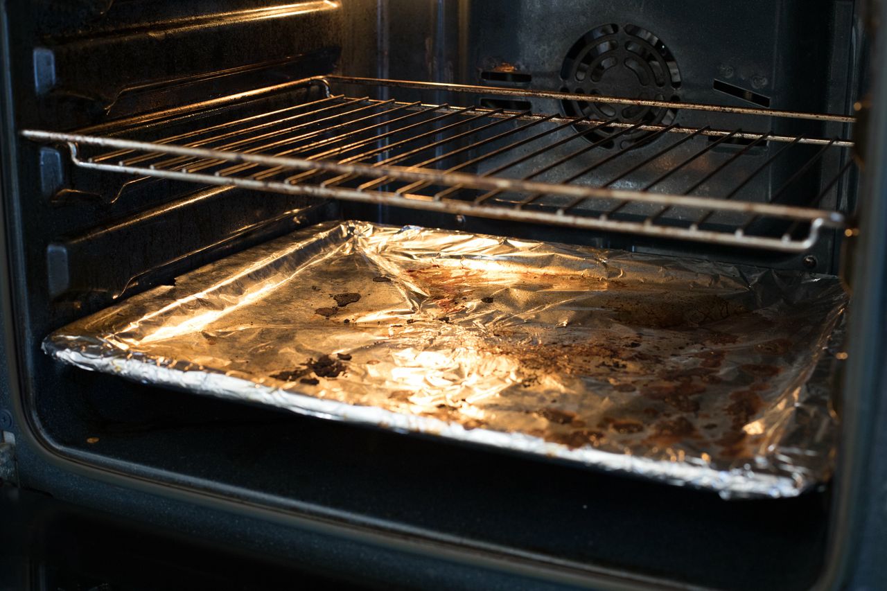 Simple trick to a spotless baking sheet using baking soda and salt