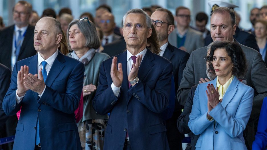 BRUSSELS, BELGIUM - APRIL 04: Deputy Secretary General of NATO, Mircea Geoană (L), NATO Secretary General Jens Stoltenberg (C) and Belgian Foreign Minister Hadja Lahbib (R) applaud speeches during the alliance's 75th anniversary celebrations at NATO headquarters on April 04, 2024 in Brussels, Belgium. The North Atlantic Treaty Organization (NATO) was founded 75 years ago in the wake of World War II and at the onset of the Cold War. Within the last year, it has added two new members, Finland and Sweden, who were spurred to seek membership following Russia's large-scale invasion of Ukraine. (Photo by Omar Havana/Getty Images)