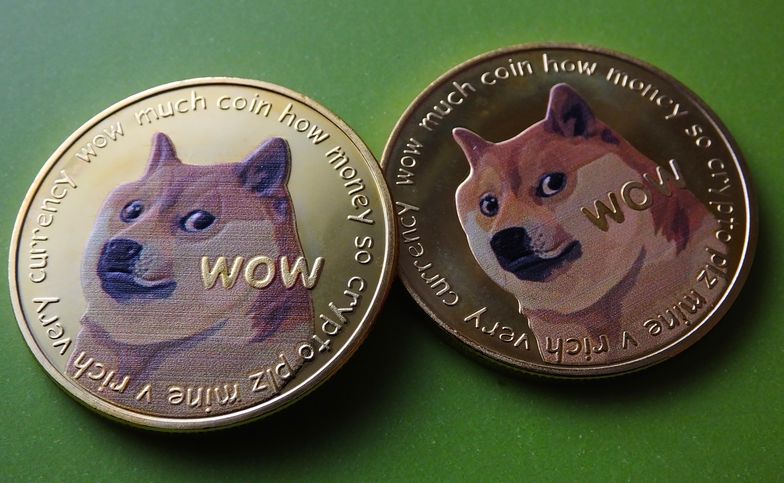 YICHANG, CHINA - APRIL 26: Visual representations of digital cryptocurrencies Dogecoin are seen on April 26, 2021 in Yichang, Hubei Province of China. (Photo by Liu Junfeng/VCG via Getty Images)