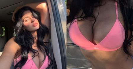 Zalotna Kylie Jenner pręży silikonowe implanty w różowym staniku za 240 złotych. Prawdziwa sexy mama?