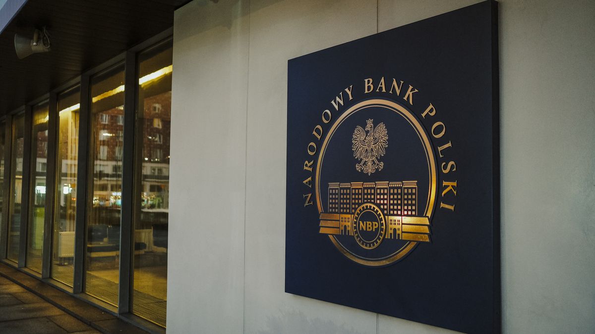 A sign for the Polish national bank, also known as Narodowy Bank Polski (NBP), outside the central bank's headquarters in Warsaw, Poland, on Wednesday, Jan. 4, 2022. Poland left borrowing costs unchanged as the threat of an economic recession overshadows concerns over the highest inflation in more than a quarter century. Photographer: Damian Lemaski/Bloomberg via Getty Images