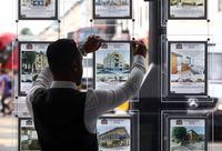 Housing As Home Values May Fall More Than 30% On BrexitAn employee places an advert for a residential house for sale into an estate agent's window in this arranged photograph in the Hackney borough of London, U.K., on Thursday, July 21, 2016. London's seven-year housing boom may be about to end after the U.K. voted to leave the European Union. Photographer: Chris Ratcliffe/Bloomberg via Getty ImagesBloombergEurope, EMEA, British, E.U., EU