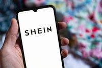 SPAIN - 2021/11/26: In this photo illustration, the fashion retailer Shein mobile app seen displayed on a smartphone screen. (Photo Illustration by Davide Bonaldo/SOPA Images/LightRocket via Getty Images)