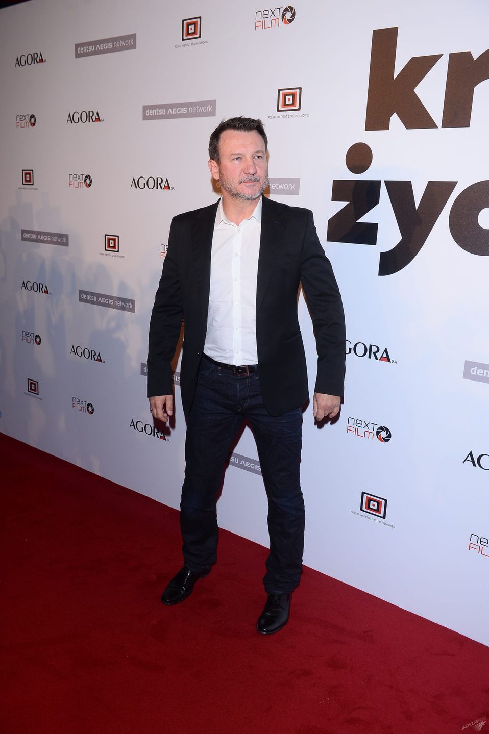Robert Więckiewicz na premierze filmu "Król życia"
