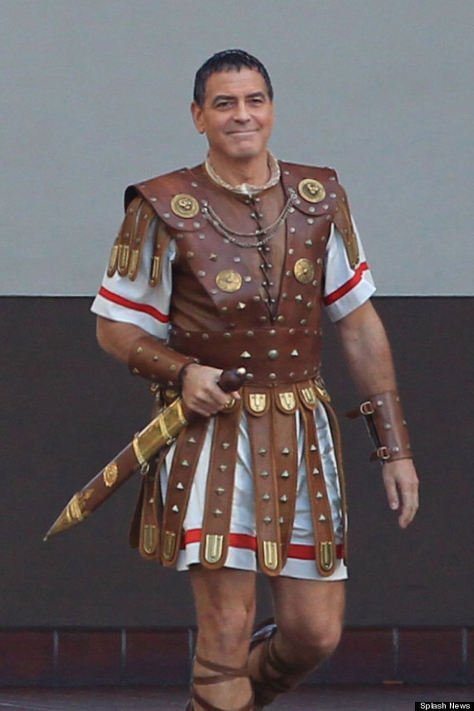 George Clooney dressed as a gladiator seen coming out of a taxi cab while filming scenes for the movie 'Hail Caesar' at Union Station. Los Angeles, California - Thursday December 4, 2014. Photograph: Miguel Aguilar/Sam Sharma, © PacificCoastNews. Los Angeles Office: +1 310.822.0419 sales@pacificcoastnews.com FEE MUST BE AGREED PRIOR TO USAGE