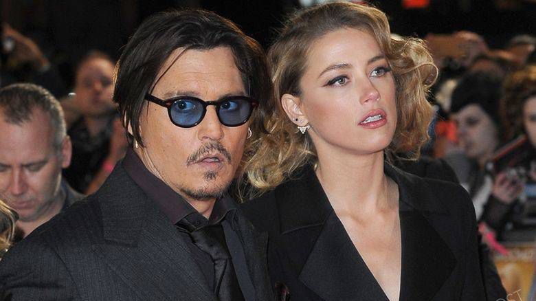 LONDON, ENGLAND - JANUARY 19: Johnny Depp and Amber Heard attend the UK Premiere of Mortdecai at Empire Leicester Square on January 19, 2015 in London, EnglandCAP/BEL©Tom Belcher/Capital Pictures