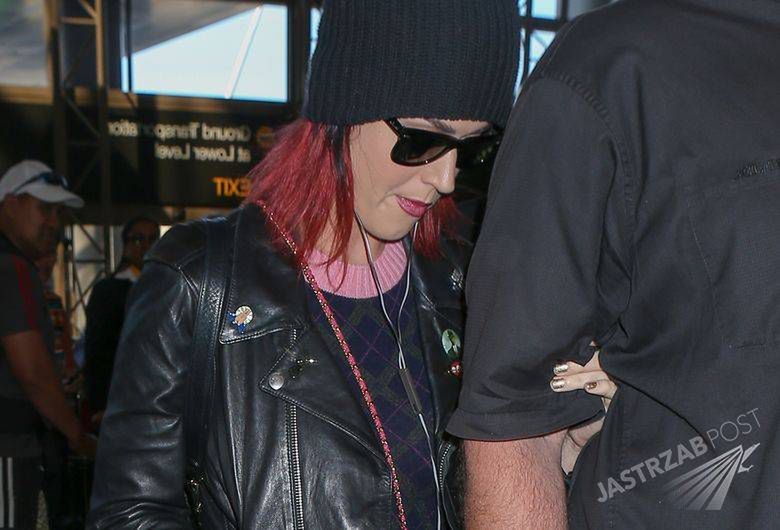 20 Oct 2014 - LOS ANGELES - USASINGER KATE PERRY LEAVING LOS ANGELES AT LAX AIRPORT ALL SHY AND SPORTING A BABY BUMP WHILE WALKING THRU THE TERMINAL HOLDING BODYGUARD ARMS.BYLINE MUST READ : XPOSUREPHOTOS.COM***UK CLIENTS - PICTURES CONTAINING CHILDREN PLEASE PIXELATE FACE PRIOR TO PUBLICATION *****UK CLIENTS MUST CALL PRIOR TO TV OR ONLINE USAGE PLEASE TELEPHONE  44 208 344 2007 ***