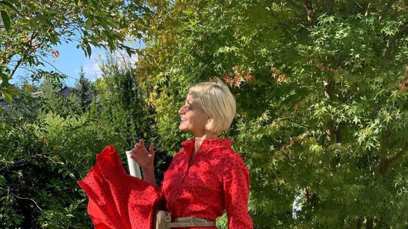 Małgorzata Kożuchowska w czerwonej sukience w groszki