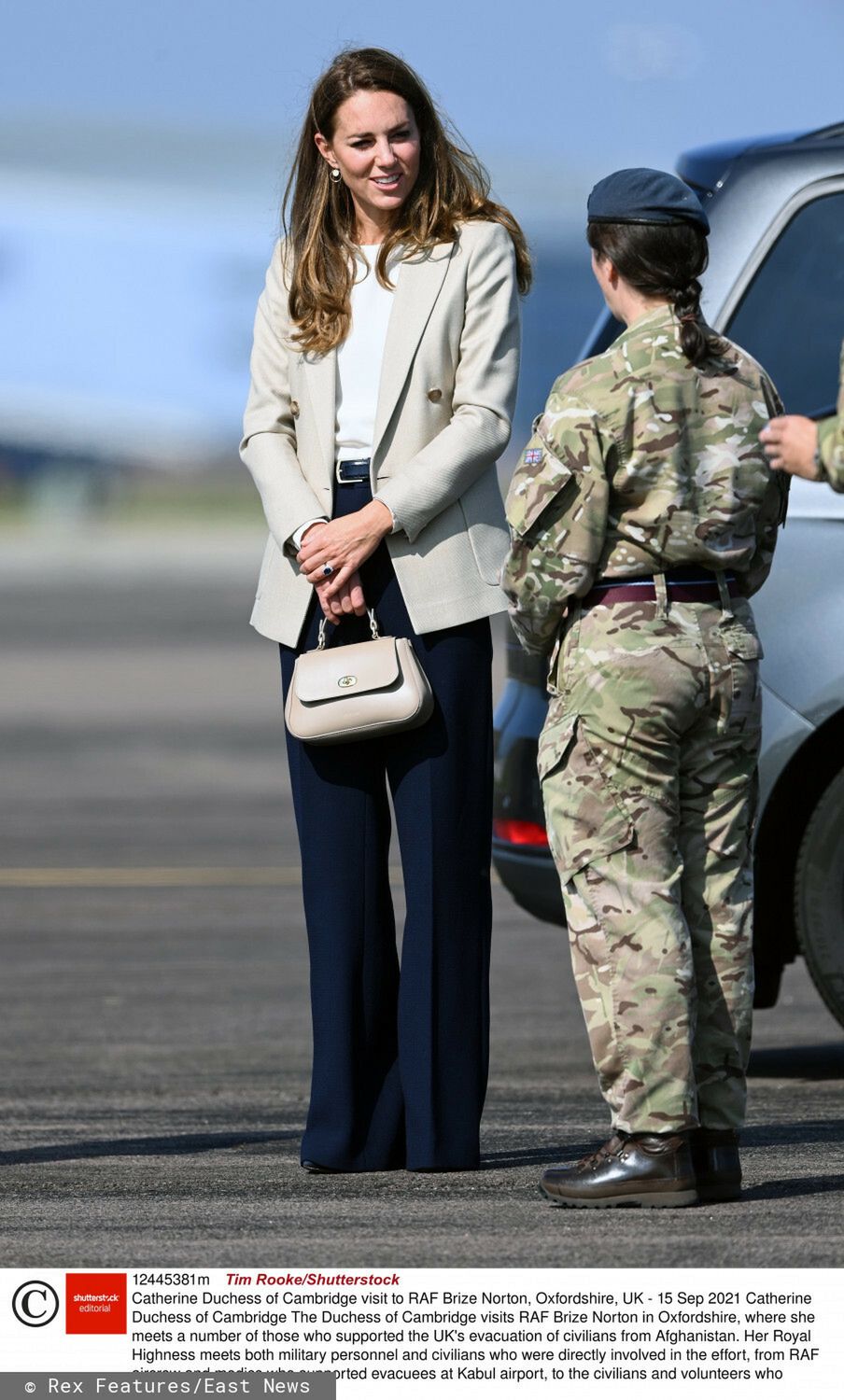 Mandatory Credit: Photo by Tim Rooke/Shutterstock (12445381m)  Catherine Duchess of Cambridge  Catherine Duchess of Cambridge visit to RAF Brize Norton, Oxfordshire, UK - 15 Sep 2021  The Duchess of Cambridge visits RAF Brize Norton in Oxfordshire, where she meets a number of those who supported the UK's evacuation of civilians from Afghanistan. Her Royal Highness meets both military personnel and civilians who were directly involved in the effort, from RAF aircrew and medics who supported evacuees at Kabul airport, to the civilians and volunteers who established a Repatriation Centre at RAF Brize Norton providing key supplies and support on their arrival into the UK.