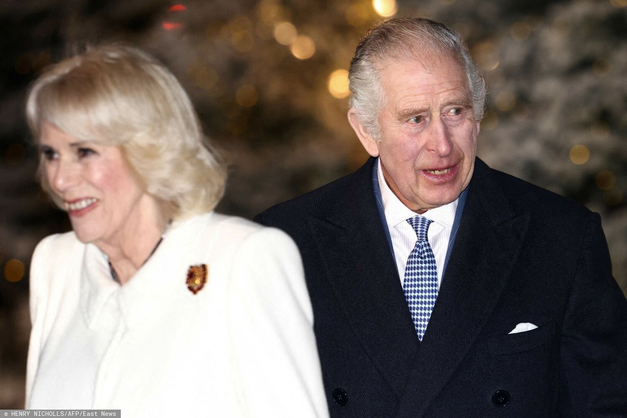 Britain's Camilla, Queen Consort (L) and Britain's King Charles III arrive to attend "Together At Christmas Carol Service" at Westminster Abbey, in London, on December 15, 2022. (Photo by HENRY NICHOLLS / POOL / AFP)