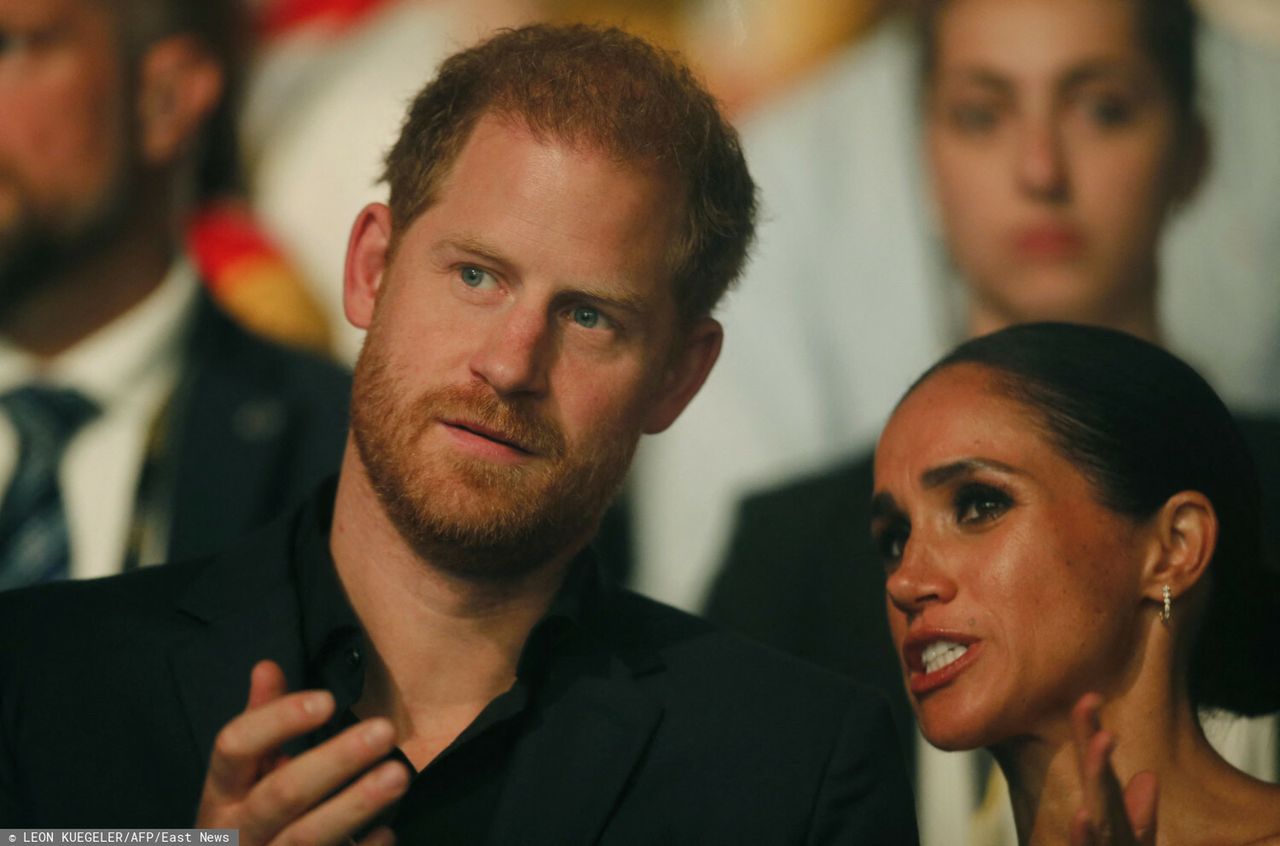Harry, Duke of Sussex and patron of the Invictus Games (L), and his wife Meghan, Duchess of Sussex, attend the closing ceremony of the 2023 Invictus Games in Duesseldorf, western Germany on September 16, 2023. The Invictus Games, an international sports competition for wounded soldiers founded by British royal Prince Harry in 2014, was taking place from September 9 to 16, 2023 in Duesseldorf. (Photo by LEON KUEGELER / AFP)