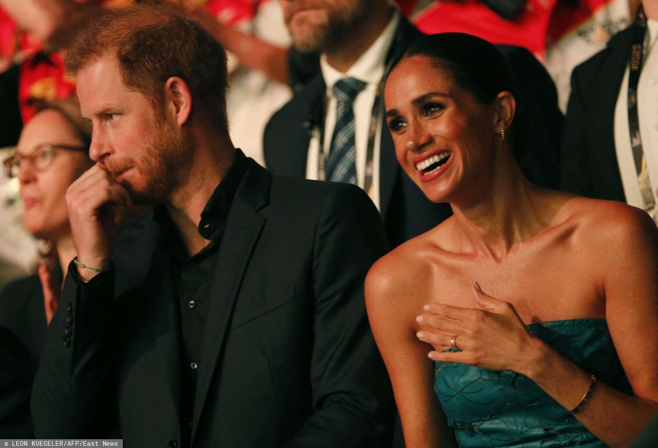 Harry, Duke of Sussex and patron of the Invictus Games (L), and his wife Meghan, Duchess of Sussex, attend the closing ceremony of the 2023 Invictus Games in Duesseldorf, western Germany on September 16, 2023. The Invictus Games, an international sports competition for wounded soldiers founded by British royal Prince Harry in 2014, was taking place from September 9 to 16, 2023 in Duesseldorf. (Photo by LEON KUEGELER / AFP)