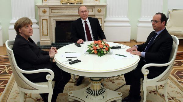Rosyjski prezydent Władimir Putin,kanclerz Niemiec Angela Merkel i prezydent Francji Francois Hollande