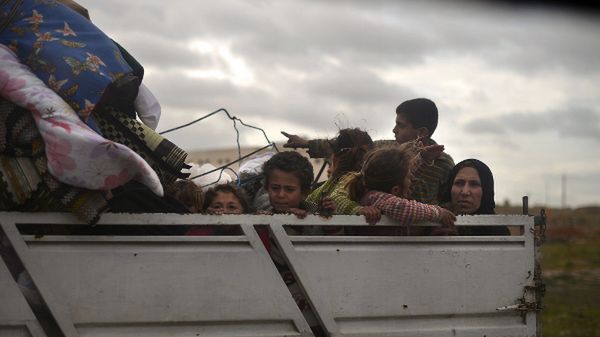 Syryjska rodzina opuszczająca Aleppo