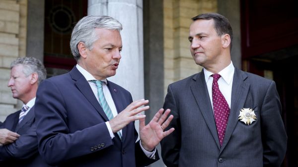 Didier Reynders i Radosław Sikorski