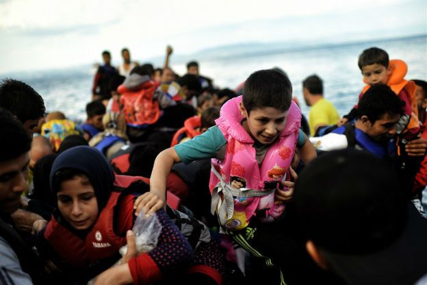 Davutoglu o migrantach: Turcja nie jest obozem koncentracyjnym