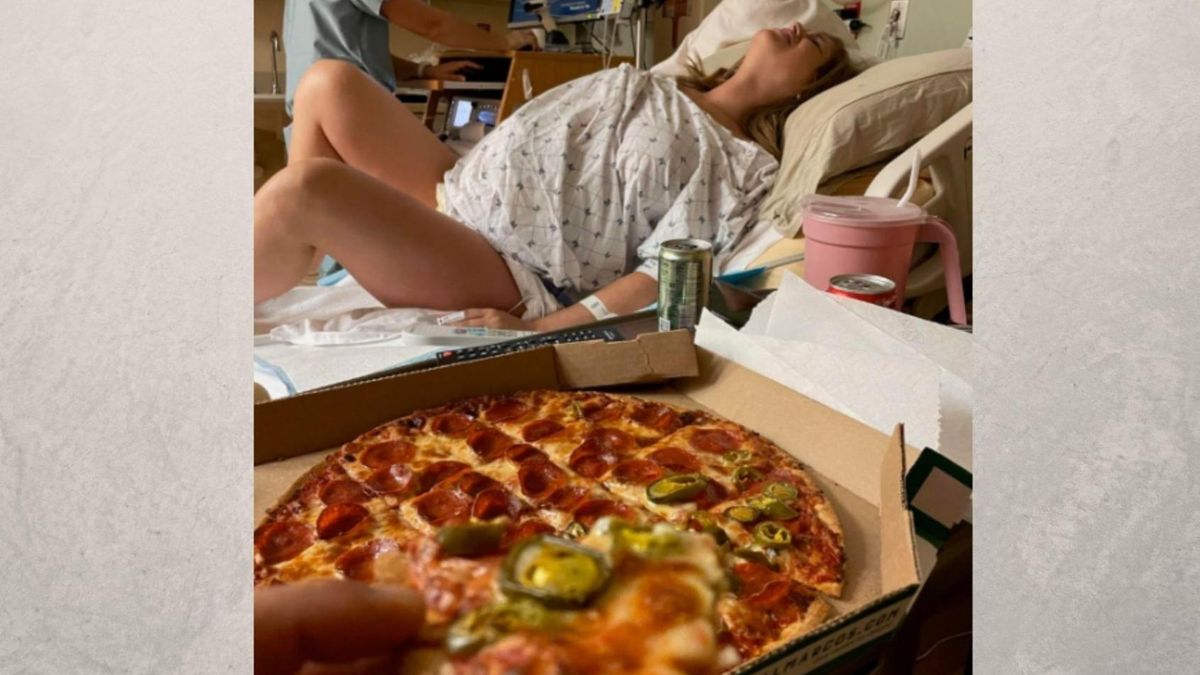 Mężczyzna jadł pizzę na sali, gdy partnerka zaczęła rodzić