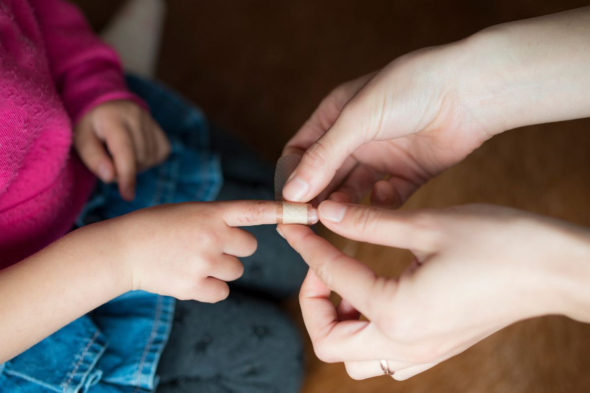 A bandage on the finger.