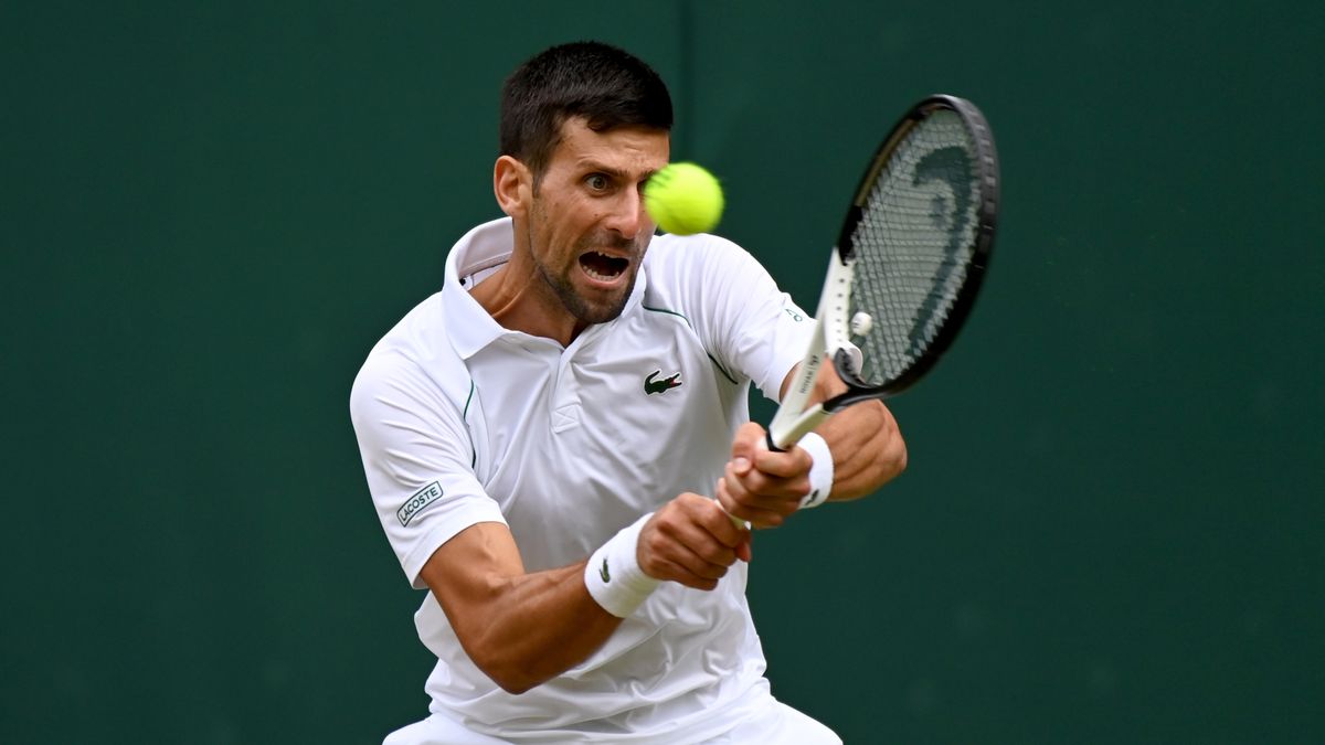 LONDON, ENGLAND - JULY 05: Novak Djokovic of Serbia in action in the Men's Singles Quarter Finals Match against Jannik Sinner of Italy during day nine of The Championships Wimbledon 2022 at All England Lawn Tennis and Croquet Club on July 05, 2022 in London, England. (Photo by Stringer/Anadolu Agency via Getty Images)