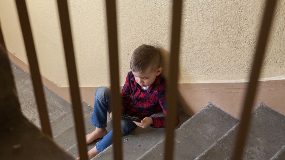 A single child is on his phone in the stairwell.Samotne dziecko oglada na telefonie na klatce schodowej. A lonely child watches on the phone in the stairwellgreg801bullying, internet, mobile phone, boys, telephone, smart phone, education, violence, sadness, problems, distraught, portable information device, crying, fear, frustration, anxiety, text messaging, aggression, emotional stress, worried, wireless technology, furious, cyborg, abuse, depression - sadness, cruel, loneliness, staircase, communication, social issues, solitude, sitting, sending, watching, 4-5 years, getting away from it all, peer pressure, preschool student, depression - land feature, assertiveness, threats, cyberprzemoc, dziecko, odrzucenie, bajka, fotografika, ludzie