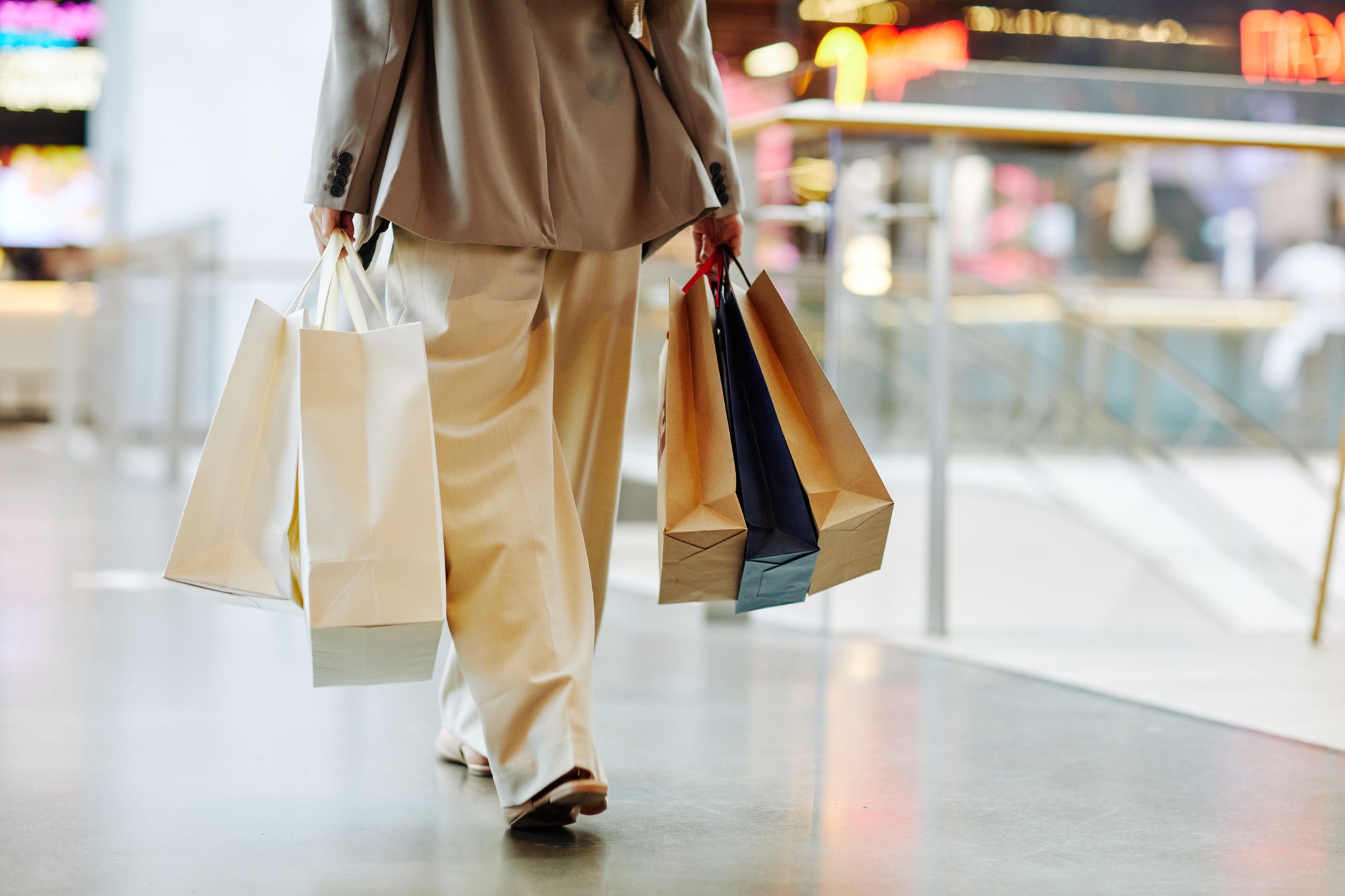 Girl with Shopping Bags in Mall Minimal
Low section of unrecognizable woman wearing pants and holding blank shopping bags while walking in mall, copy space
shopping, shopping mall, Sale, discount, shop, store, shopping bag, female, shopper, girl, businesswoman, young, woman, buying, clothes, purchase, bag, spending money, mall, retail, customer, Black friday, consumerism, commerce, minimal, day out, treat, city, downtown, fashion, Caucasian, white, legs, walking, indoors, happiness, lifestyles, holding, one, unrecognizable person, city life, carrying, close-up, leisure activity, luxury, clothing, paper bag, commercial activity