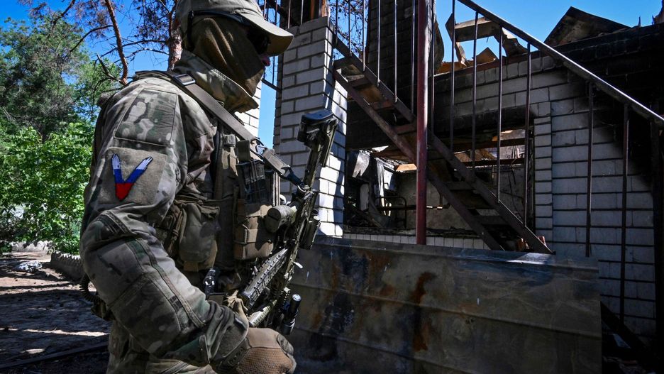 Temporary
A Russian serviceman patrols the captured piont of defence of Ukrainian army outside the town of Schast'ye on June 11, 2022, amid the ongoing Russian military action in Ukraine. (Photo by Yuri KADOBNOV / AFP)
YURI KADOBNOV