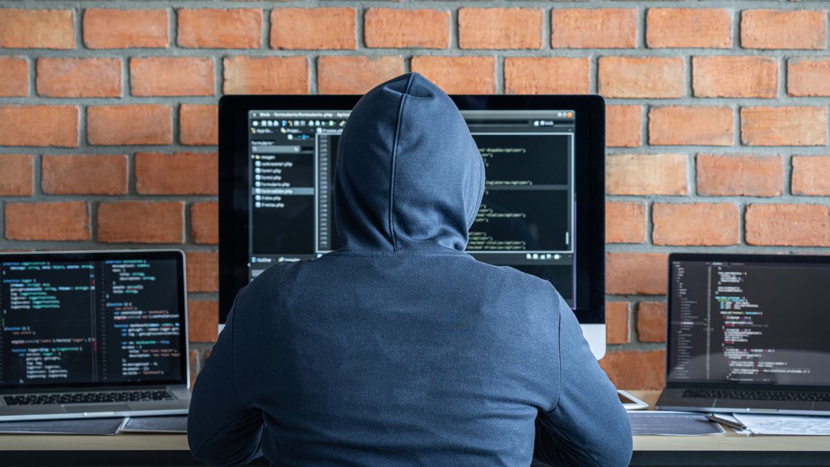 Computer hacker or cyber attack concept, Dangerous hooded hacker using multiple computers typing bad data into online system the access with a virus to infect steal information.hacker, hardware, typing, malware, jacking, spyware, database, password, programmer, software, hud, criminal, crime, dark, hack, laptop, thief, data, technology, web, code, website, computer, development, business, coding, programming, program, developer, internet, network, monitor, screen, networking, information, digital, cyber, security, hacking, web design, out source, credit card, ransomware, hoodie, phishing, attack, virus, pc, display, binary, hacker, hardware, typing, malware, jacking, spyware, database, password, programmer, software, hud, criminal, crime, dark, hack, laptop, thief, data, technology, web, code, website, computer, development, business, coding, programming, program, developer, internet, network, monitor, screen, networking, information, digital, cyber, security, hacking, web design, out source, credit card, ransomware, hoodie, phishing, attack, virus, pc, display, binary