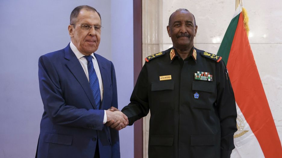 Temporary
In this photo released by Russian Foreign Ministry Press Service, Russian Foreign Minister Sergey Lavrov, left, and Sudan's Army chief Gen. Abdel-Fattah Burhan pose for a photo during their meeting in Khartoum, Sudan, on Thursday, Feb. 9, 2023. (Russian Foreign Ministry Press Service via AP)