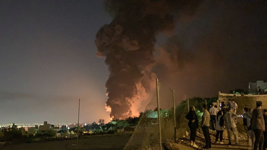 Israeli airstrikes over Tehran
TEHRAN, IRAN  JUNE 15: A thick plume of smoke rises into the night sky after an Israeli strike targeted a fuel depot in the Shahran district of Tehran, Iran on June 15 2025. (Photo by Fatemeh Bahrami/Anadolu via Getty Images)
Anadolu
israeli airstrike, fuel depot explosion, middle east conflict, june 15
