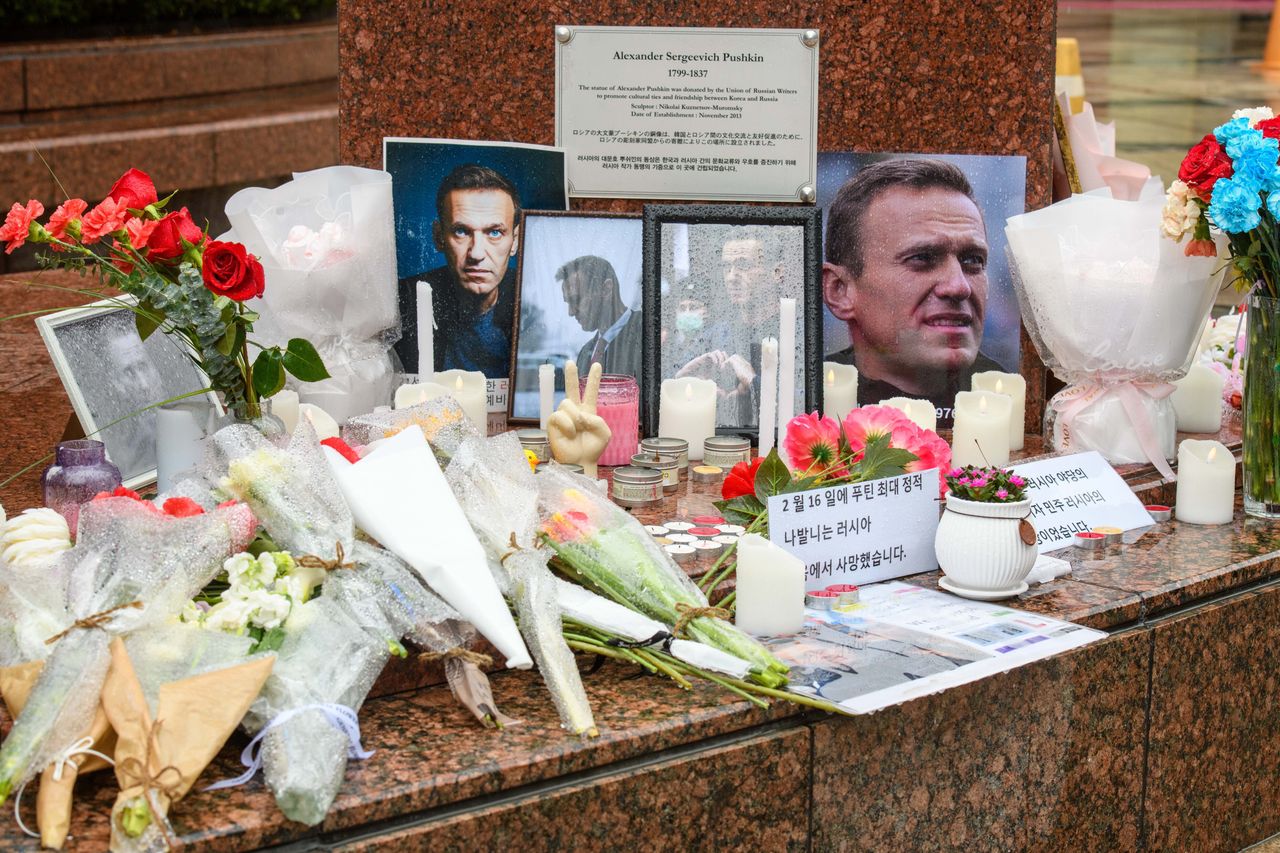 SEOUL, SOUTH KOREA - 2024/02/21: Flowers and portraits of late Russian opposition leader Alexei Navalny are seen at the memorial site in Pushkin plaza. Alexei Navalny (4 June 1976  16 February 2024) was a Russian opposition leader, lawyer, anti-corruption activist, and political prisoner. He organized anti-government protests and run for public office to oppose corruption in Russia and advocate for reforms against President Vladimir Putin and his government. (Photo by Kim Jae-Hwan/SOPA Images/LightRocket via Getty Images)