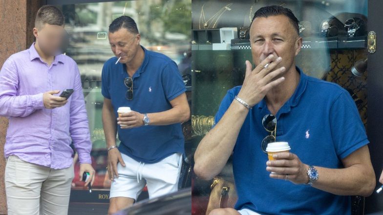 Tomasz Hajto delektuje się papierosem przed lombardem