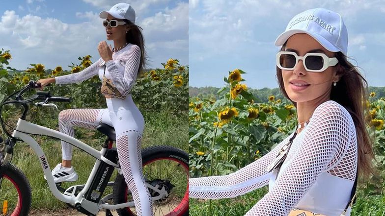 Natalia Siwiec w ażurowym komplecie i z torebeczką Louis Vuitton pod pachą przemierza na rowerze polskie bezdroża (FOTO)