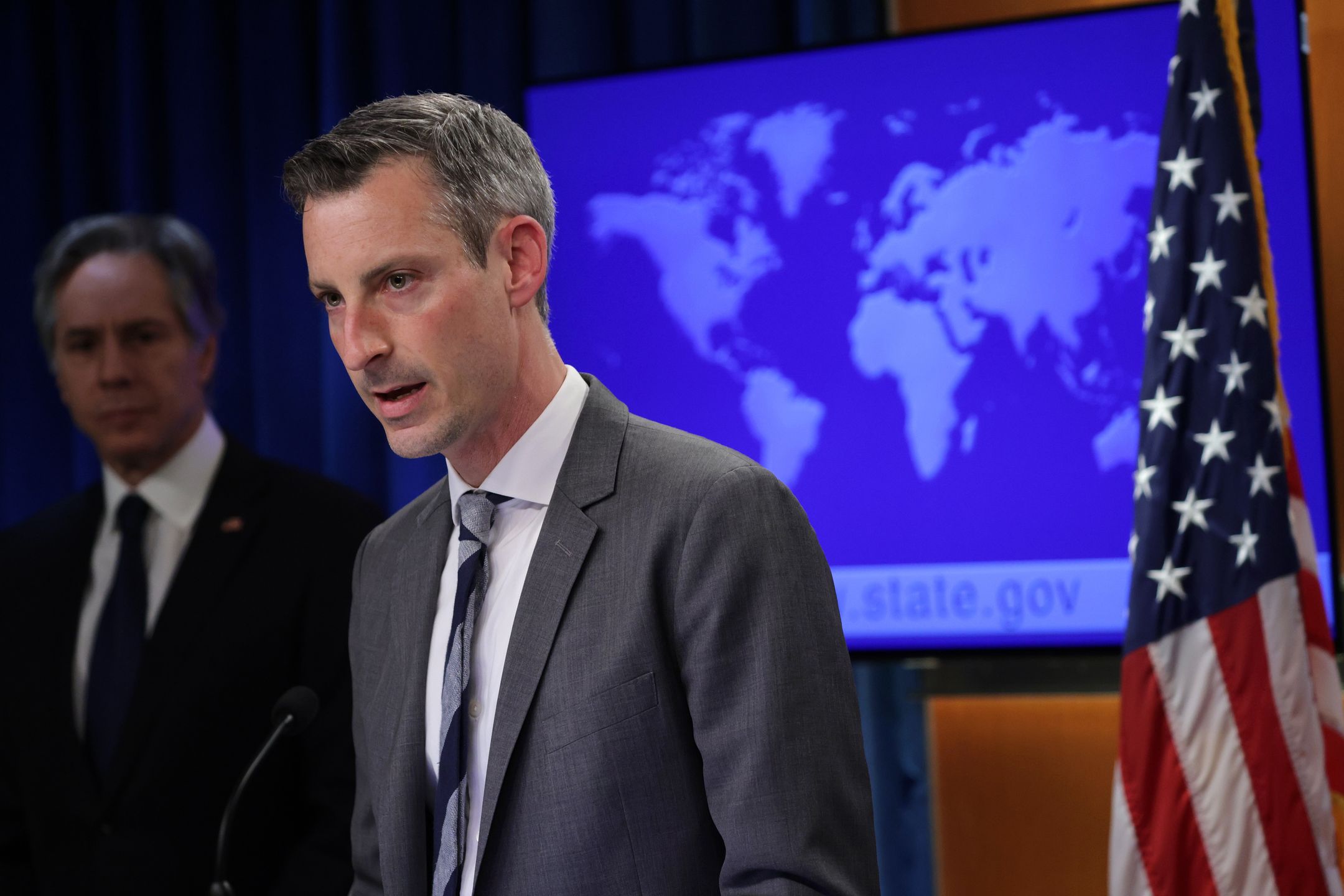 WASHINGTON, DC - APRIL 12:  U.S. State Department spokesperson Edward Price speaks as Secretary of State Antony Blinken looks on at the State Department on April 12, 2022 in Washington, DC. Secretary Blinken delivered remarks to the press on the release of the 2021 Country Reports on Human Rights Practices. (Photo by Alex Wong/Getty Images)