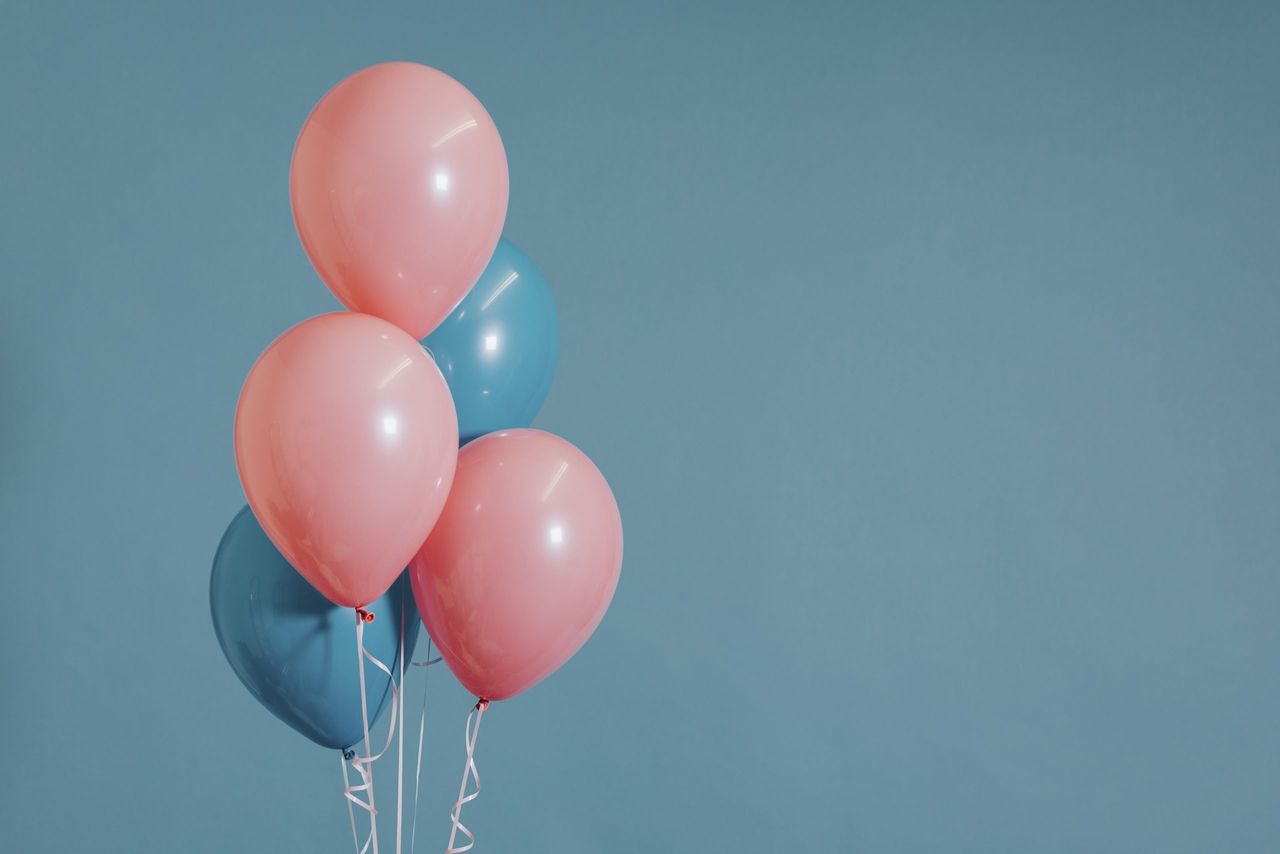 Pastel pink and blue balloons