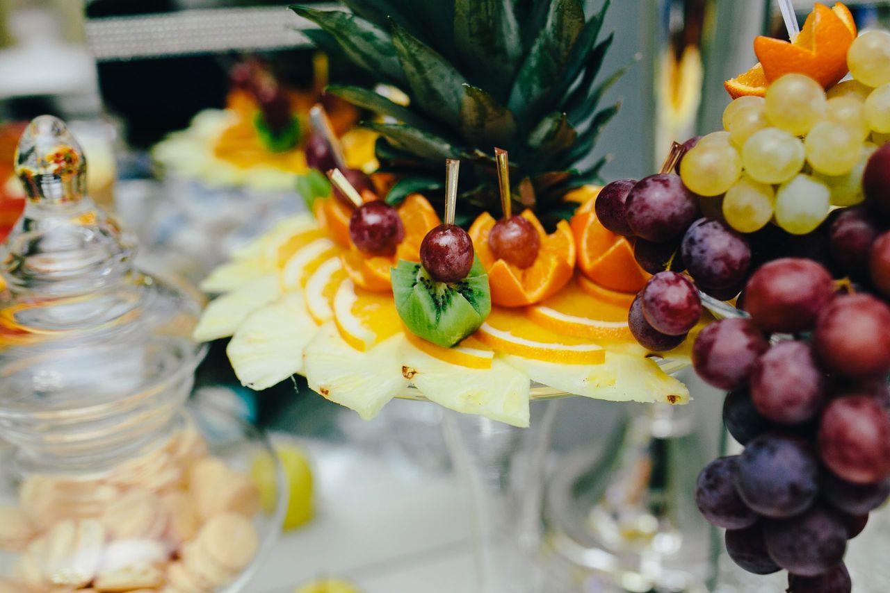 buffet with tropical fruit on the wedding banquet