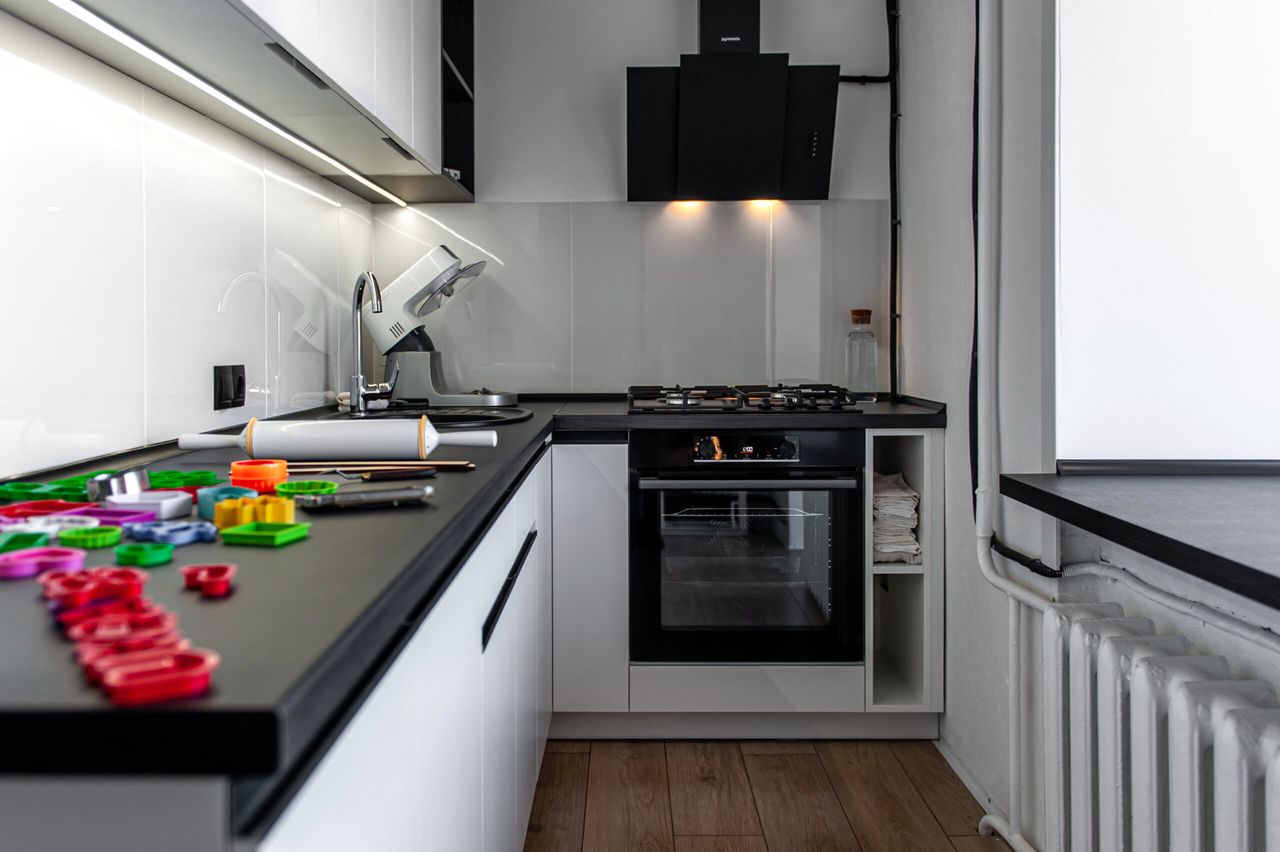 Kitchen interior with cookie cutters, cooking cookies at home.