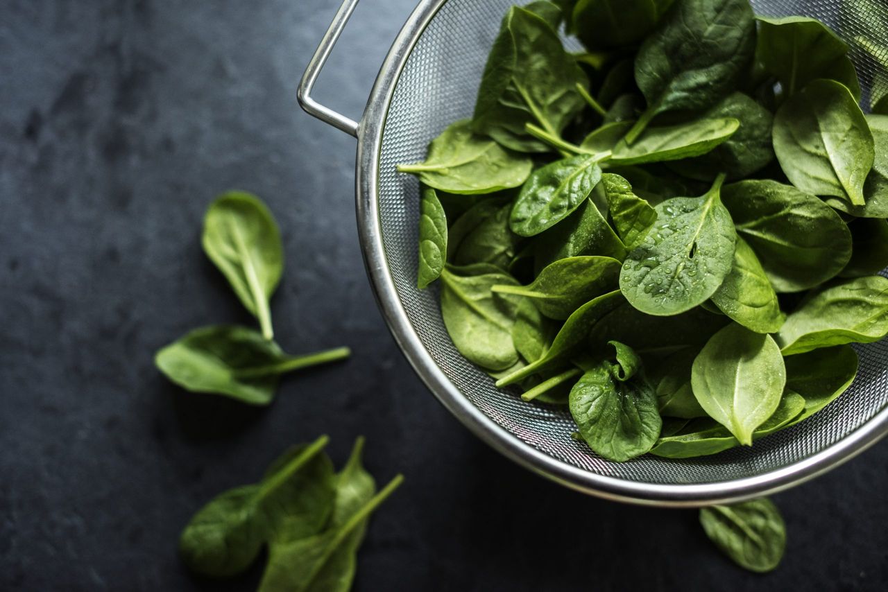 Fresh spinach leaves on a bowl