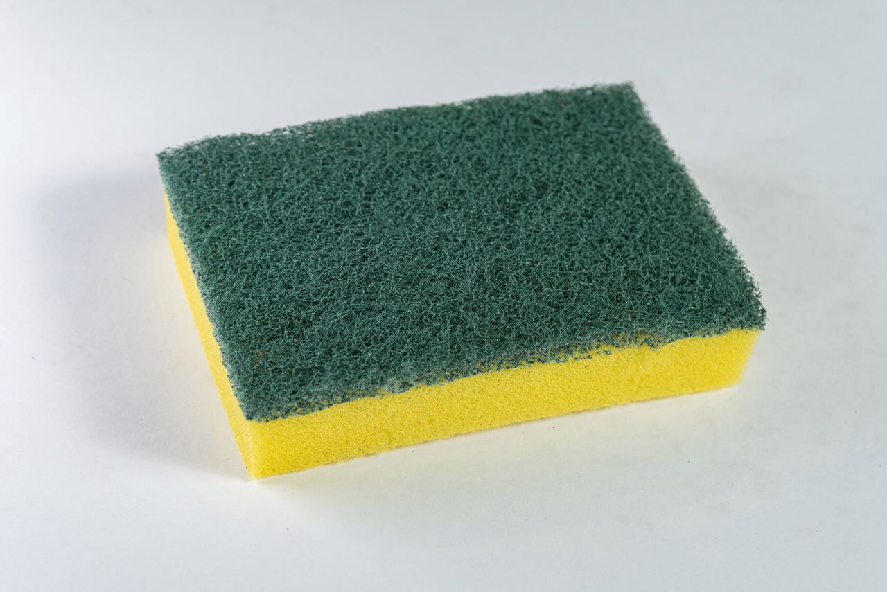 Kitchen sponge on the white background