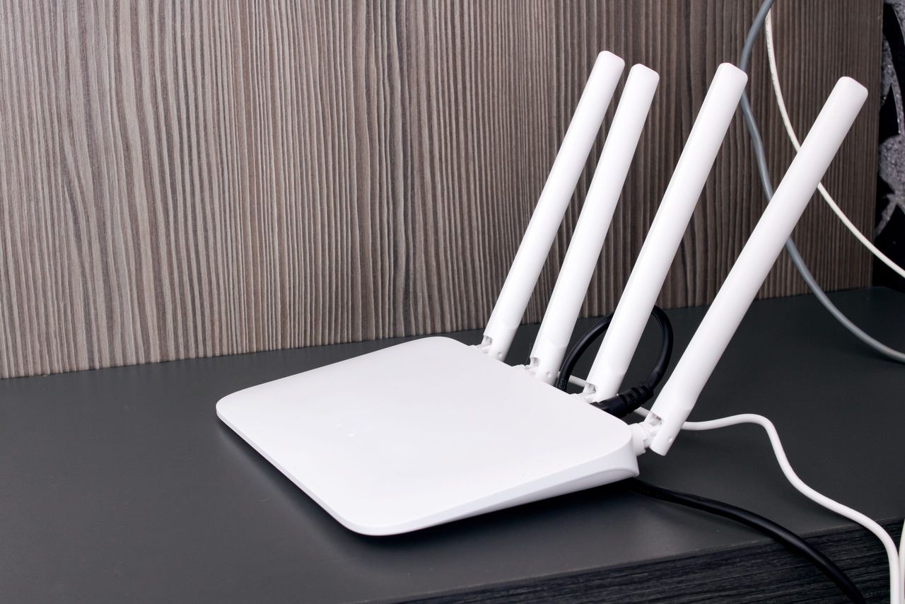 White modem with antennas on the table close up